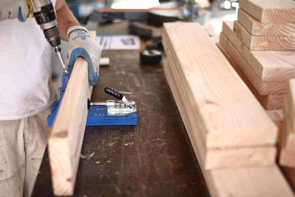 drilling pocket holes for DIY Shoe Rack Bench
