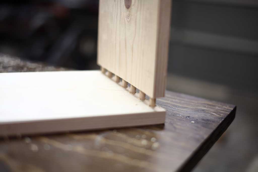 attaching boards together with dowels for DIY Offsetting bookshelf