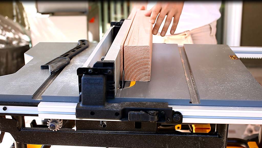 ripping a 4x4 board to make discs for DIY Family Calendar Board