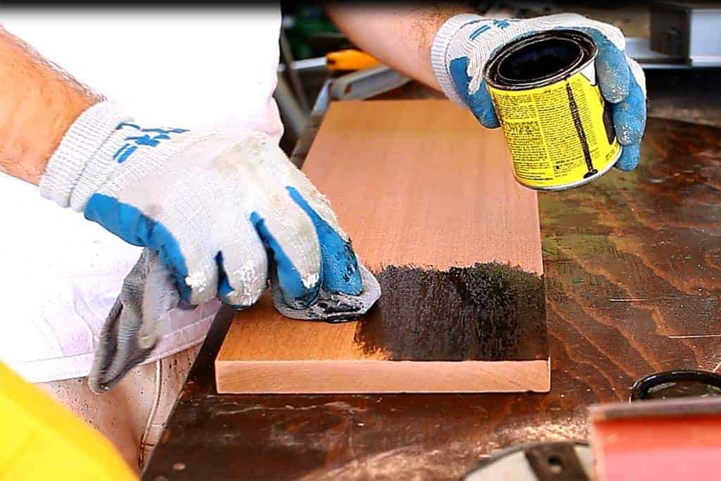 staining the DIY Family Calendar Board