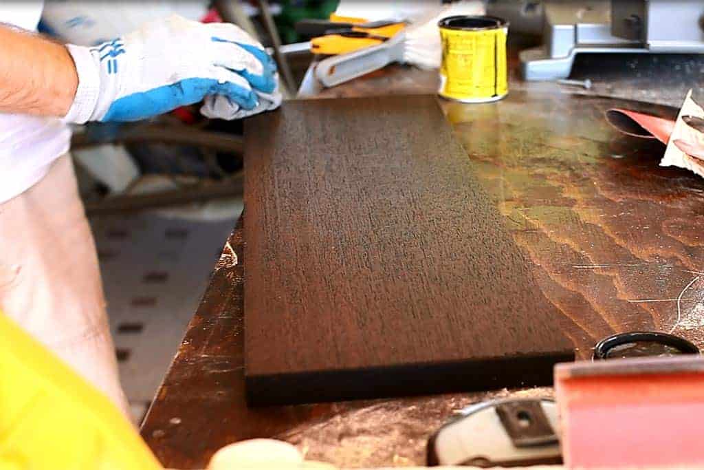 wiping off stain from DIY Family Calendar Board