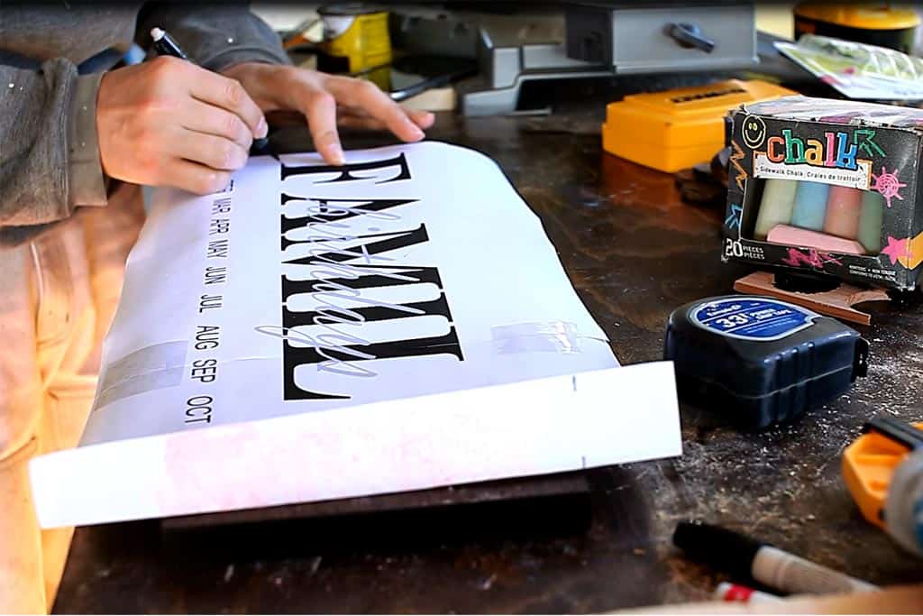 tracing the text template for DIY Family Calendar Board