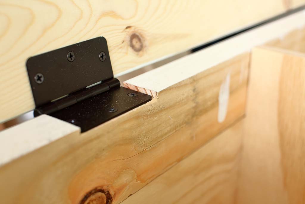 installing hinges for the DIY Corner Storage Bench