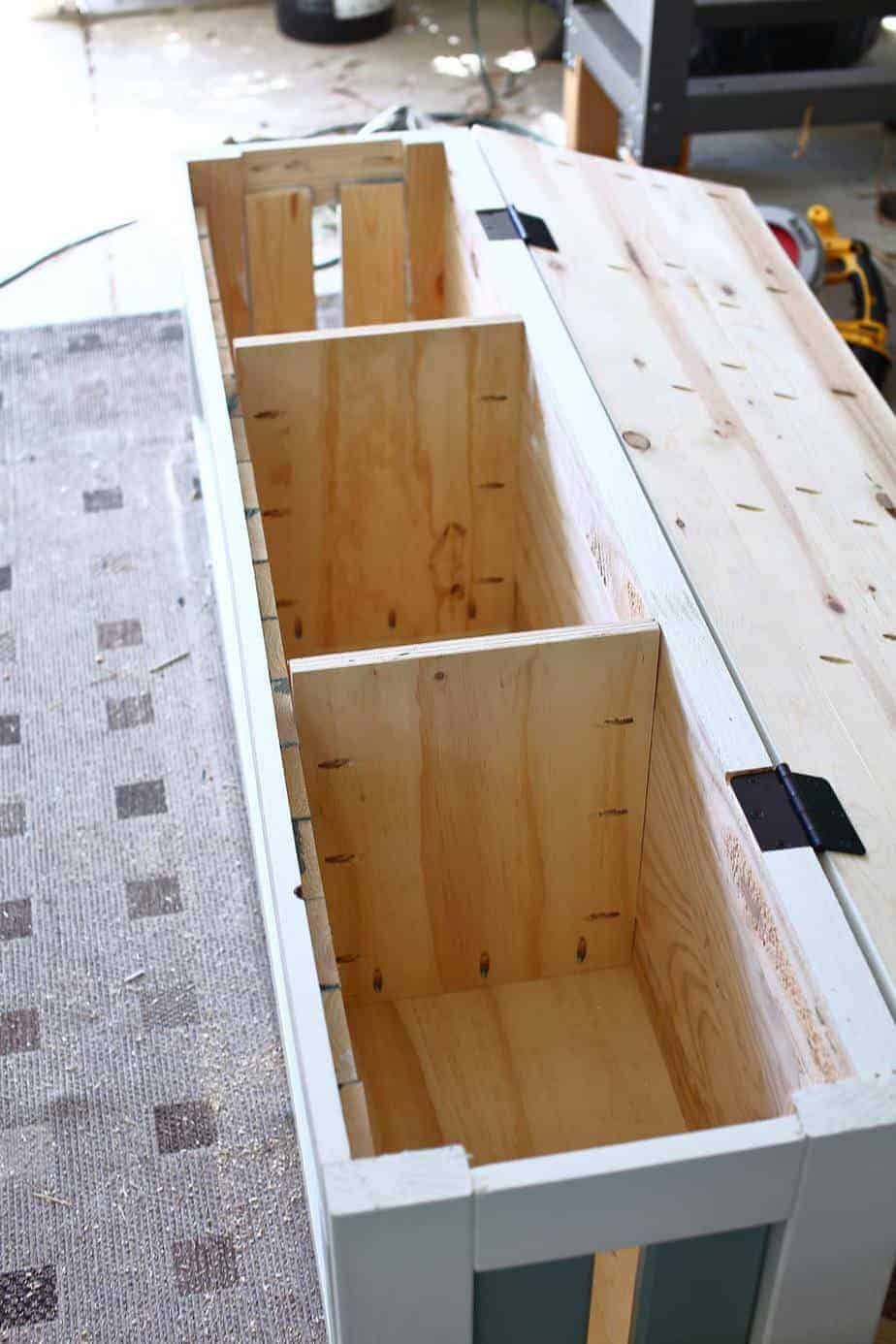 installing the dividers DIY Corner Storage Bench