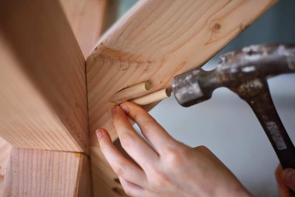 inserting dowel into the pocket hole