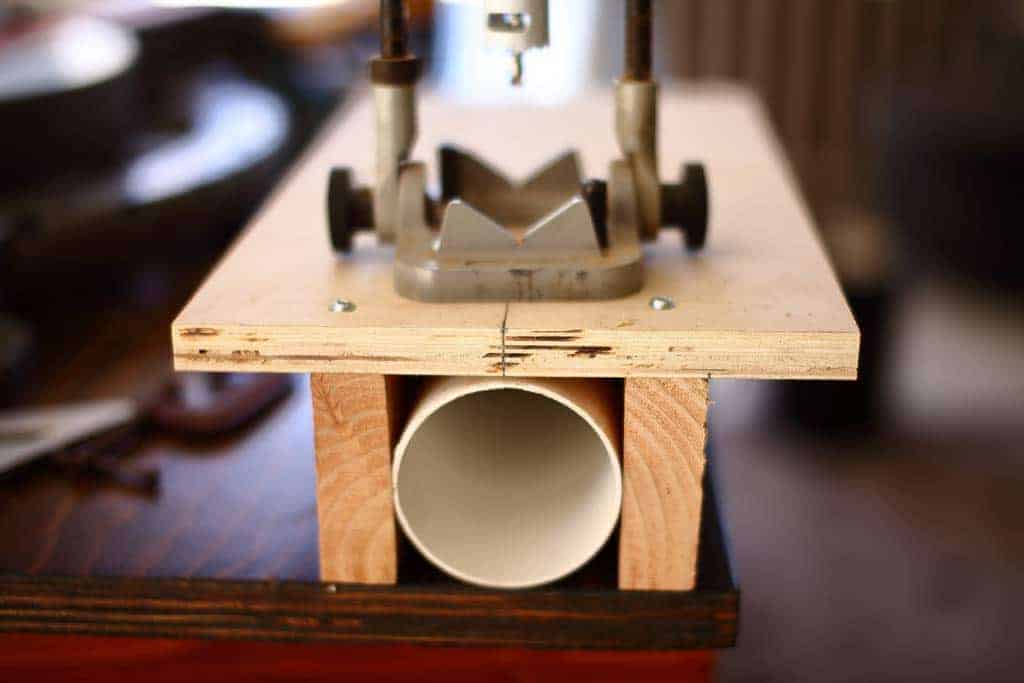 jig to cut holes in the pvc pipe for DIY PVC Pipe Patio Railing