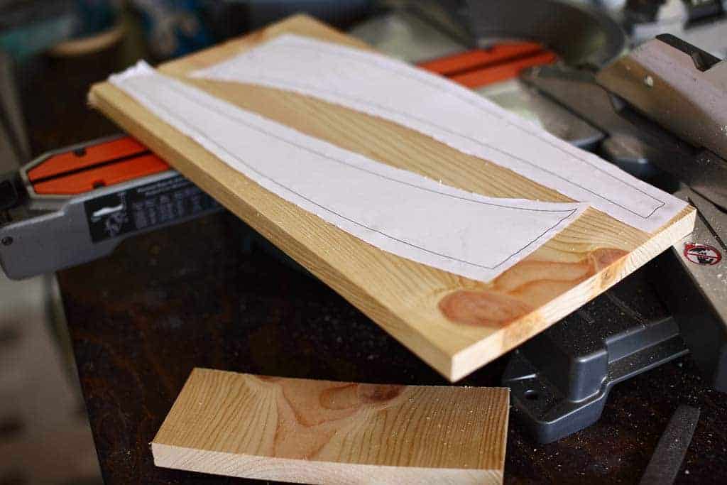 gluing template on board for DIY Indoor Plant Stand