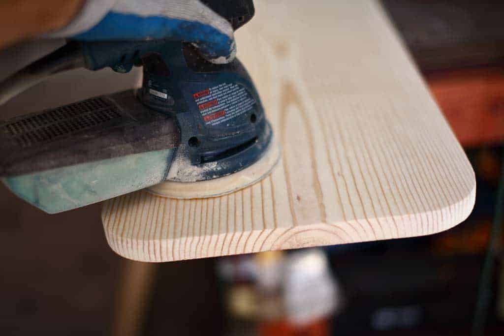 sanding board for DIY Cornhole Scoreboard