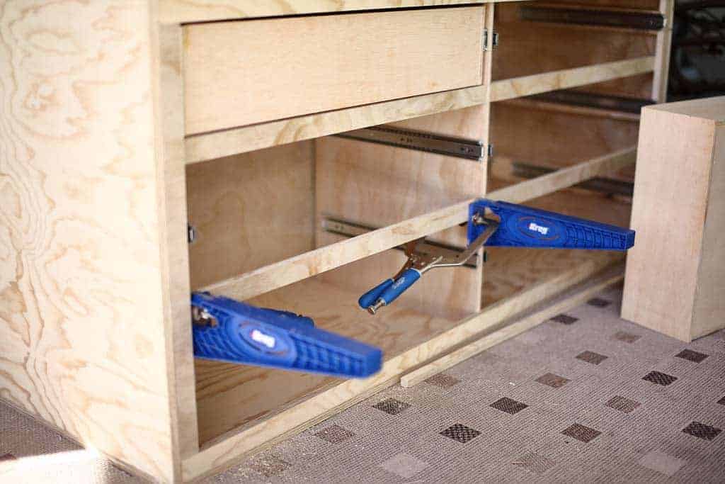 inserting drawers into the dresser