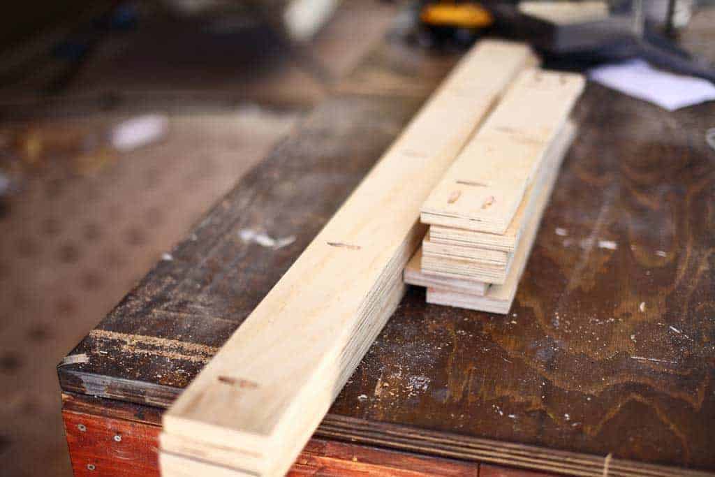 drilling holes in the frame boards