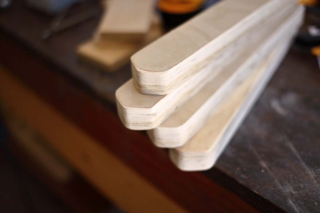 sanding the legs of the cornhole
