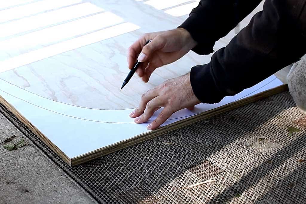 using template to draw legs on plywood
