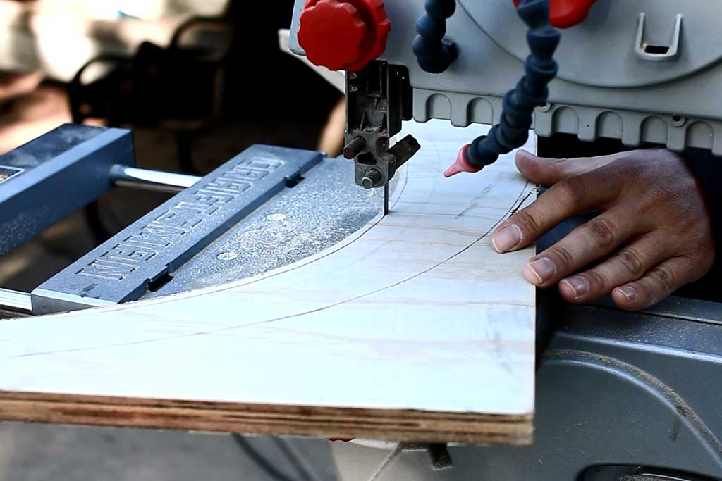 cutting out the curved legs for kitchen table