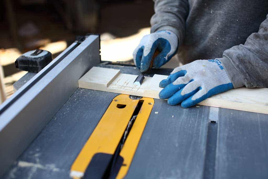 using chisel to remove wood from notch