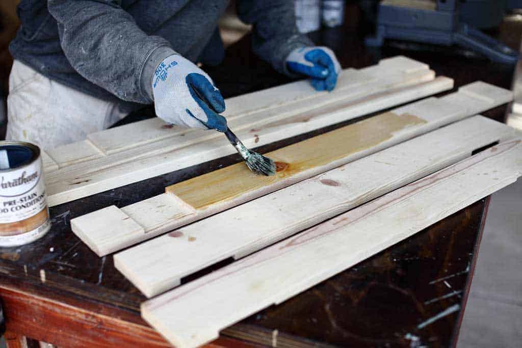 applying pre stain on wood
