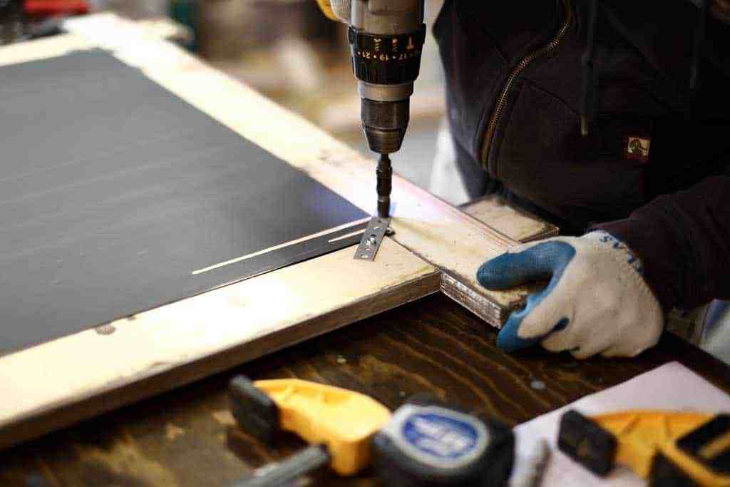 attaching mirror with a plumber strap