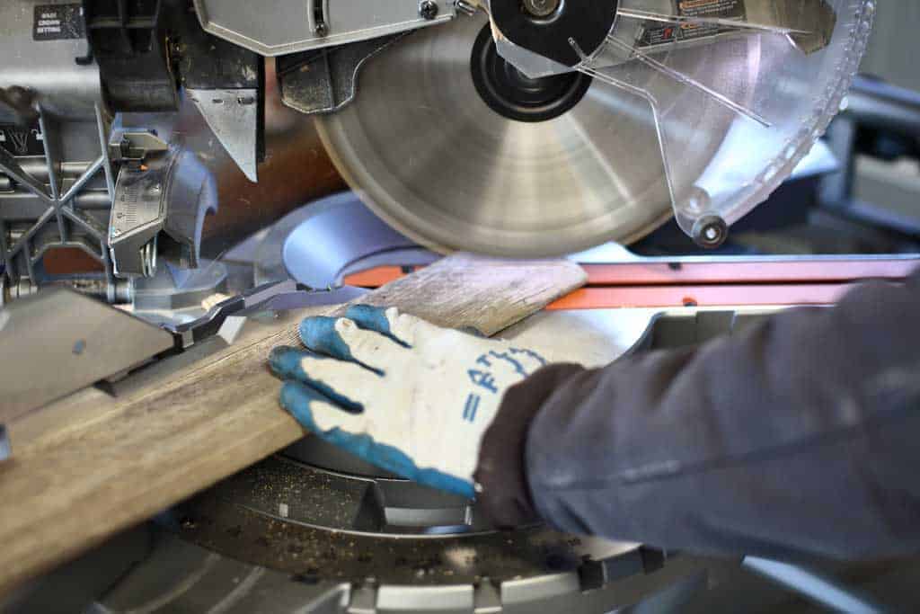 cutting reclaimed wood on the miter saw