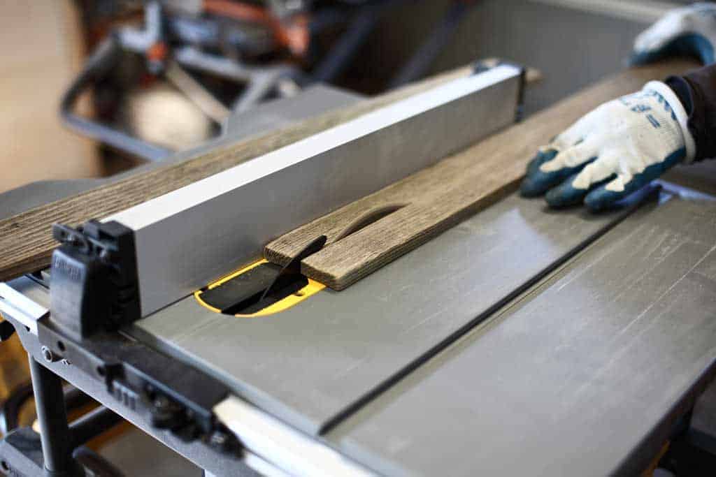 cutting reclaimed wood on the table saw