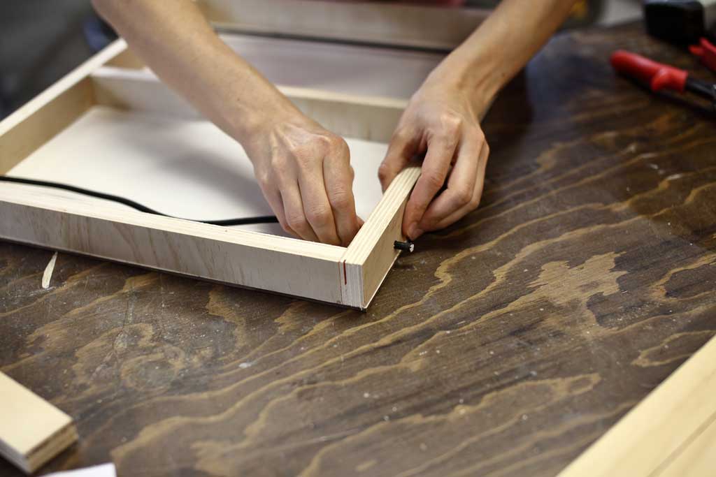 feeding the bungee cord for DIY Pucket Game