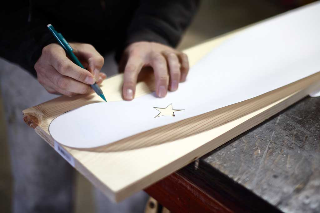 tracing over the template for DIY Curved Shelf