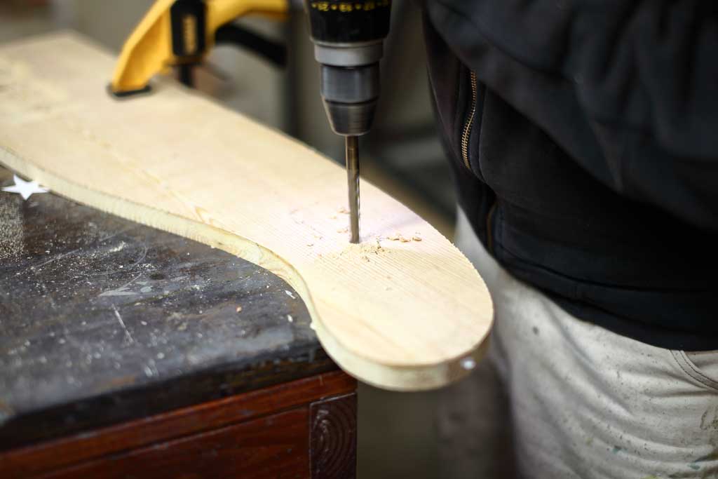 drilling a hole in the start for DIY Curved Shelf