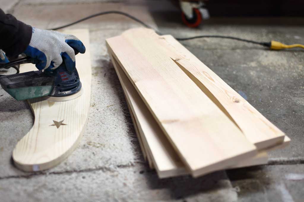 sanding DIY Curved Shelf boards