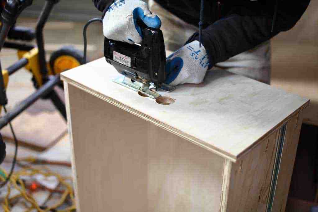 cutting hole with a jig saw for the DIY Mudroom Locker