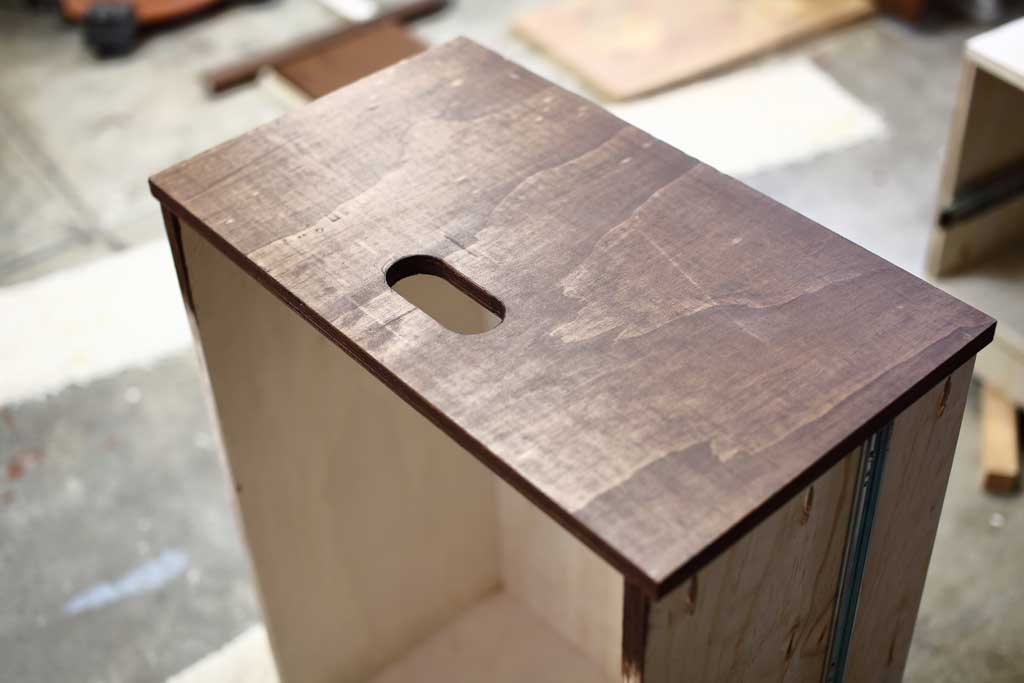 stained drawer front box of the DIY Mudroom Locker
