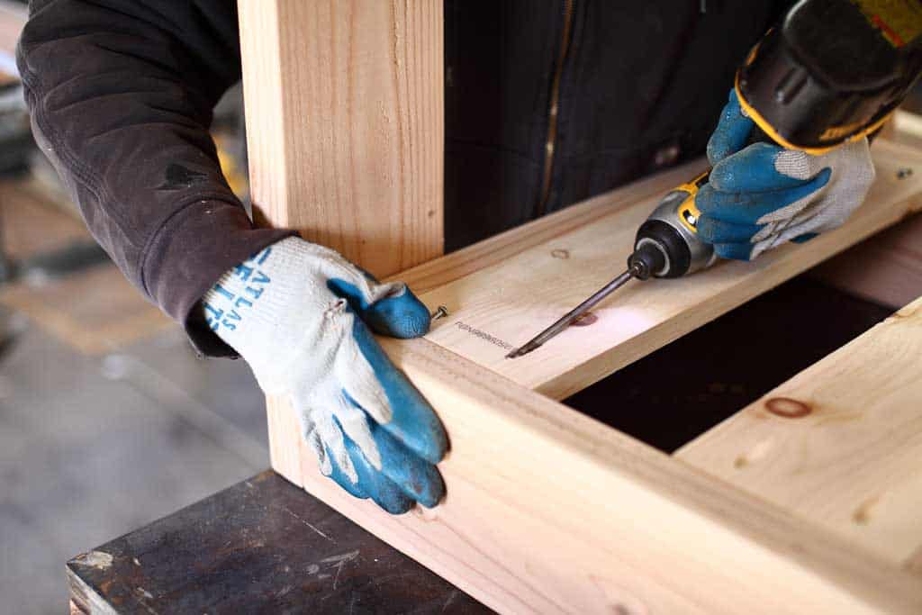 attaching bottom pieces for DIY Sensory Table