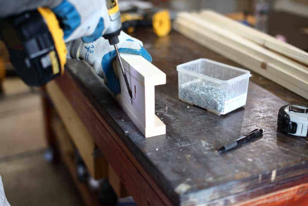attaching water ramps sides for DIY Sensory Table