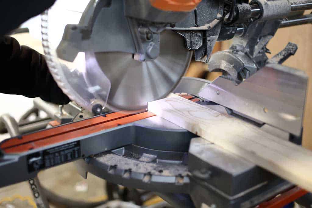 using miter saw to cut wood