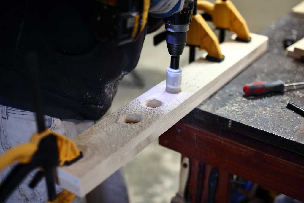 drilling holes for adjustable step of the DIY Toddler Step Stool