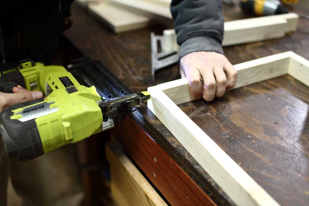 nailing the boards together for the DIY Toddler Step Stool