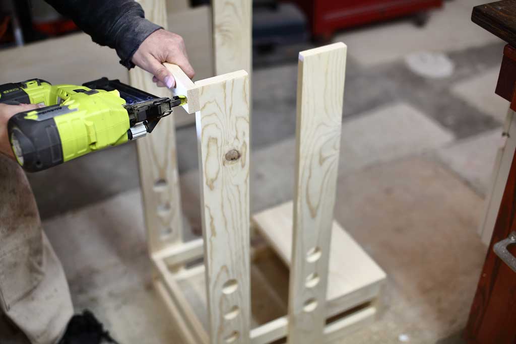 nailing the guard rails for the DIY Toddler Step Stool