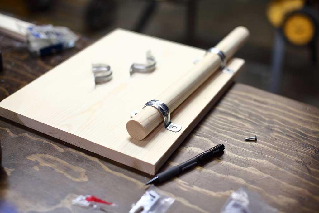 attaching dowel rod with a ridged strap