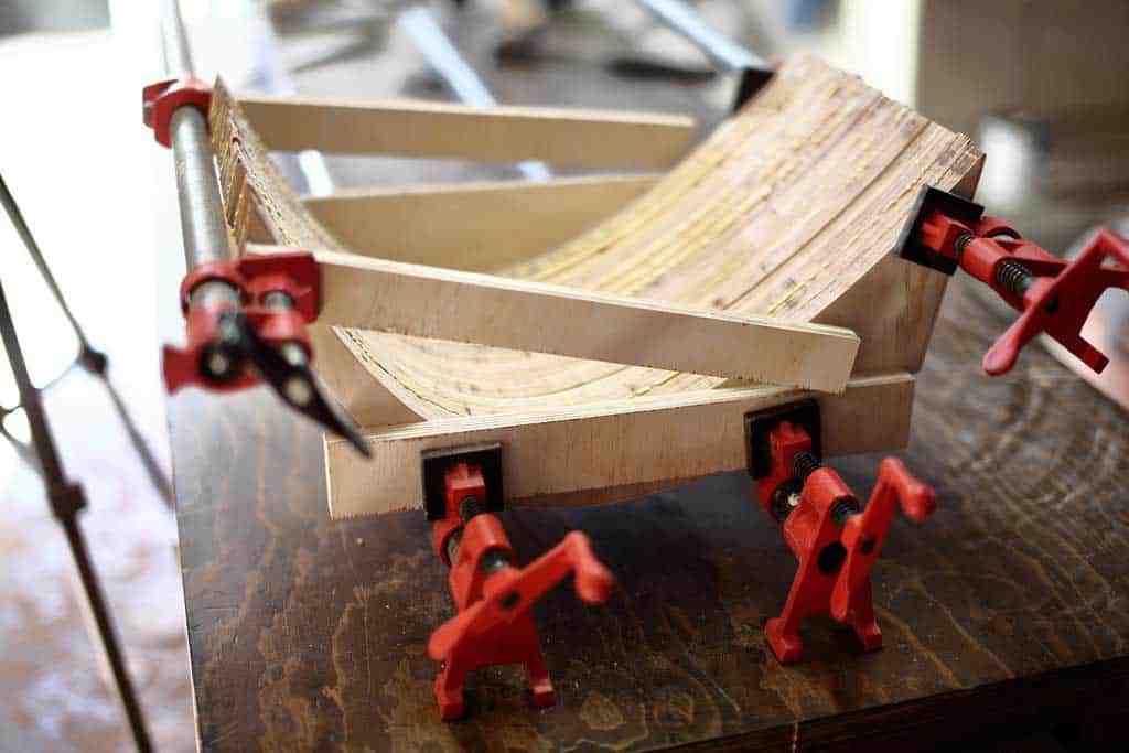 gluing curved legs together for the bench