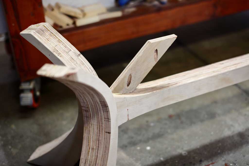 attaching diagonal supports under the bench