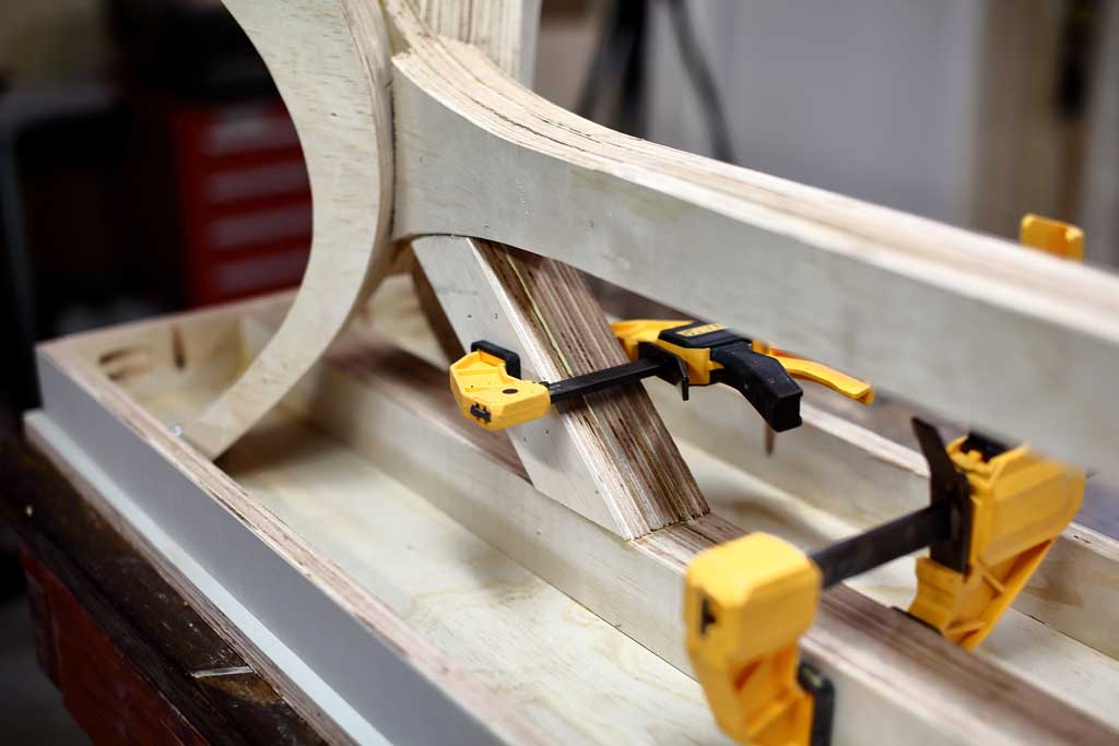 attaching diagonal brace supports under the bench