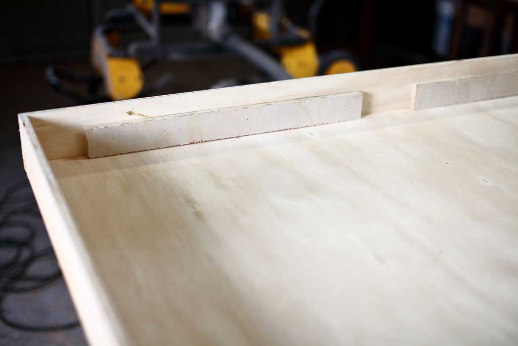 wood that supports the maze board