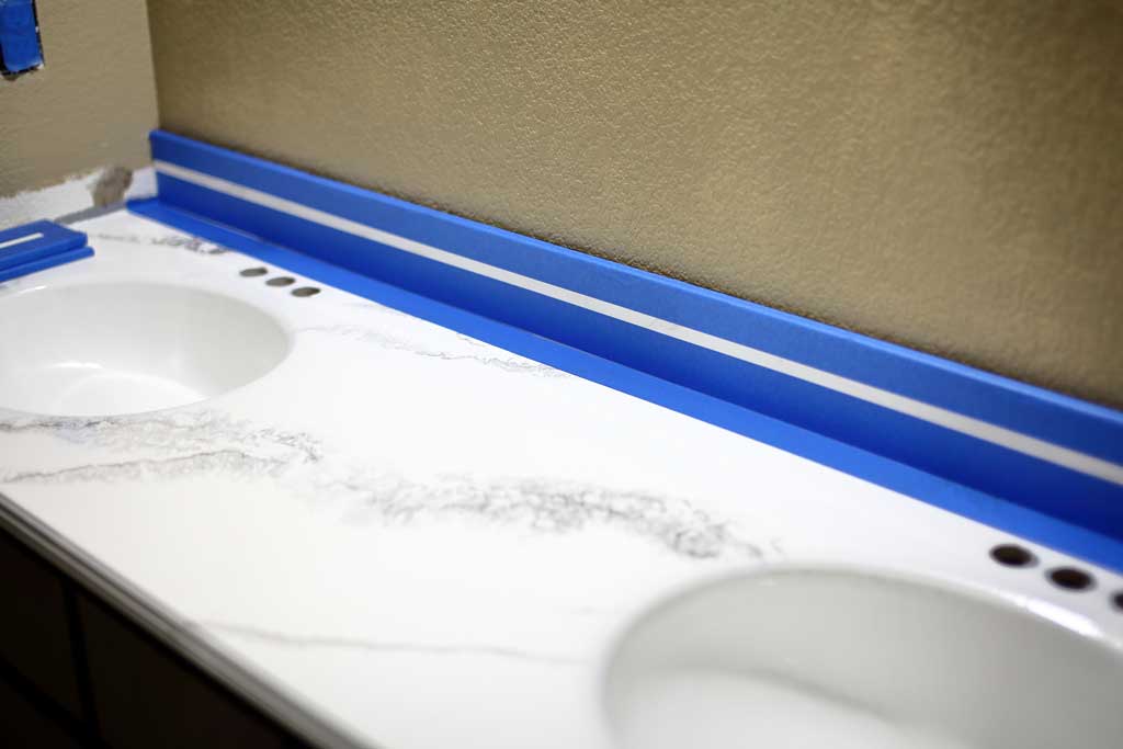 attaching backsplash to wall