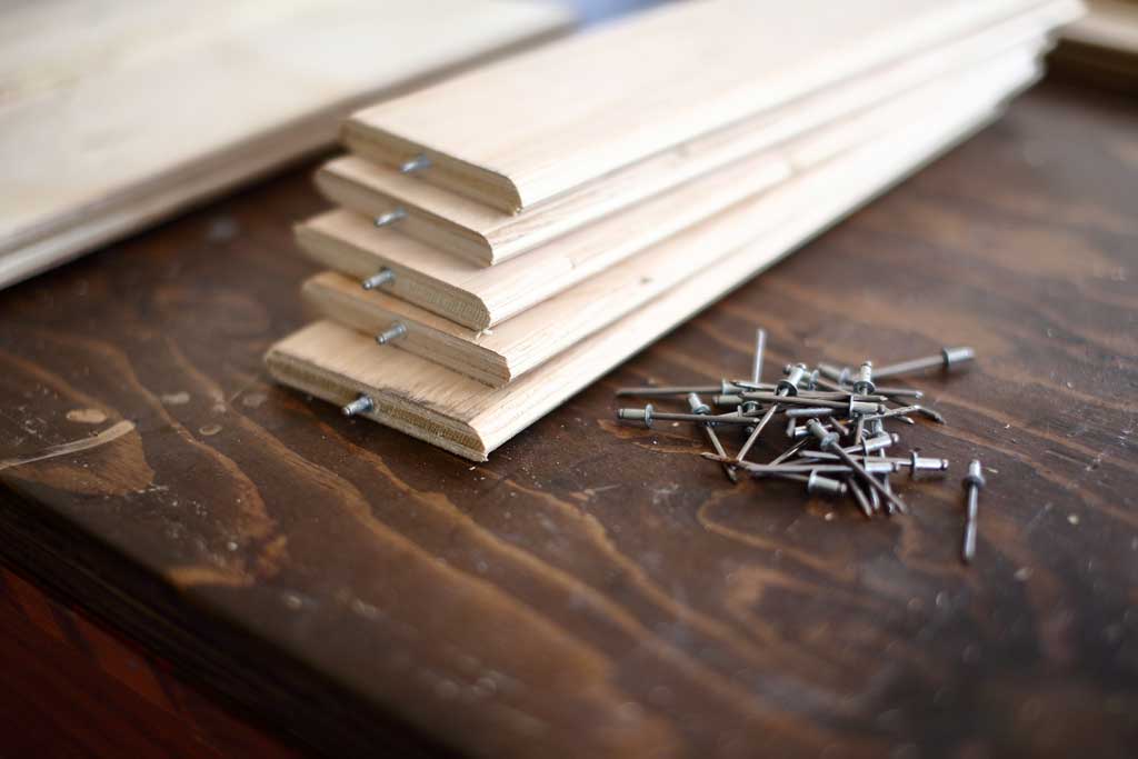 slats with pop rivets for DIY plantation shutters
