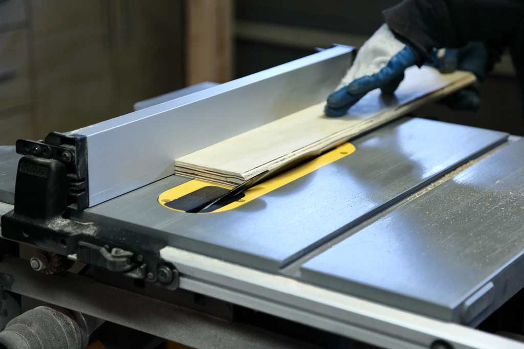 using table saw to chamber plywood rails