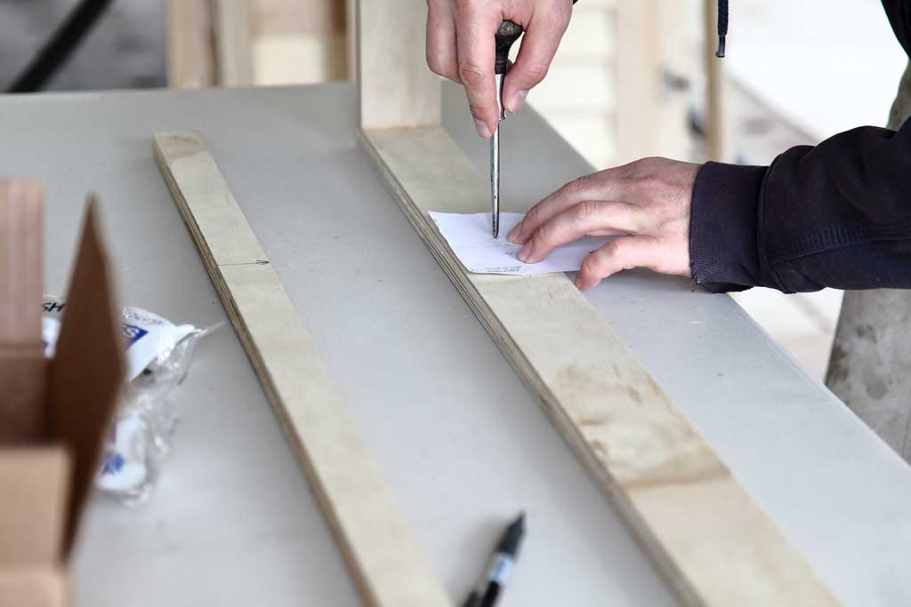 marking location where to attaching mounting hinges