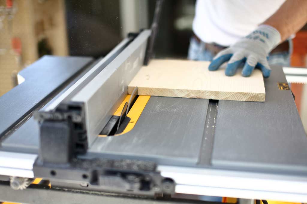 cutting wood on table saw