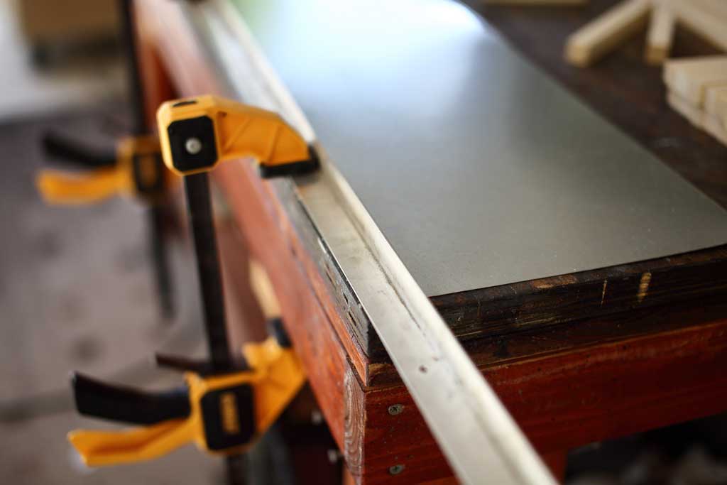 sheet metal for aligning blocks for light fixture