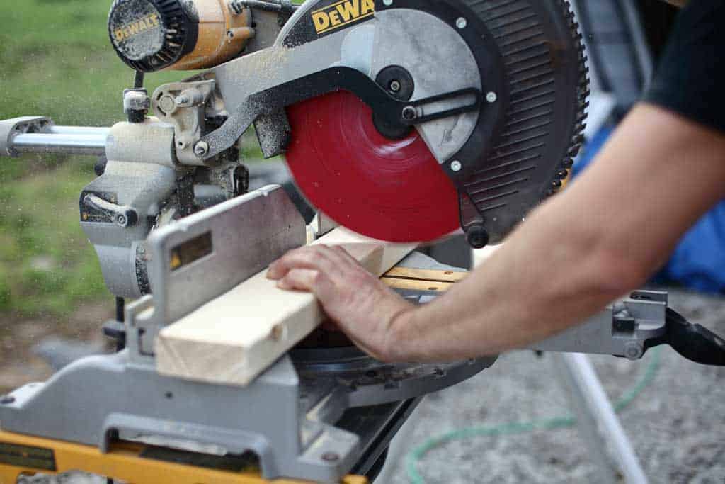 using a miter saw to cut wood
