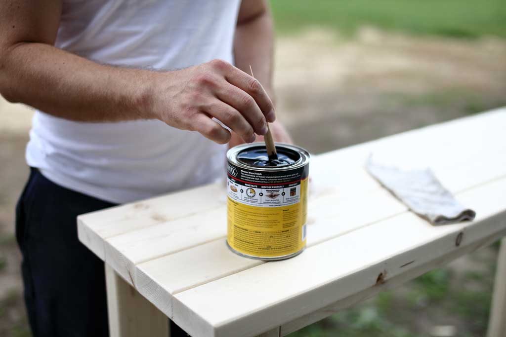 mixing stain with a stick