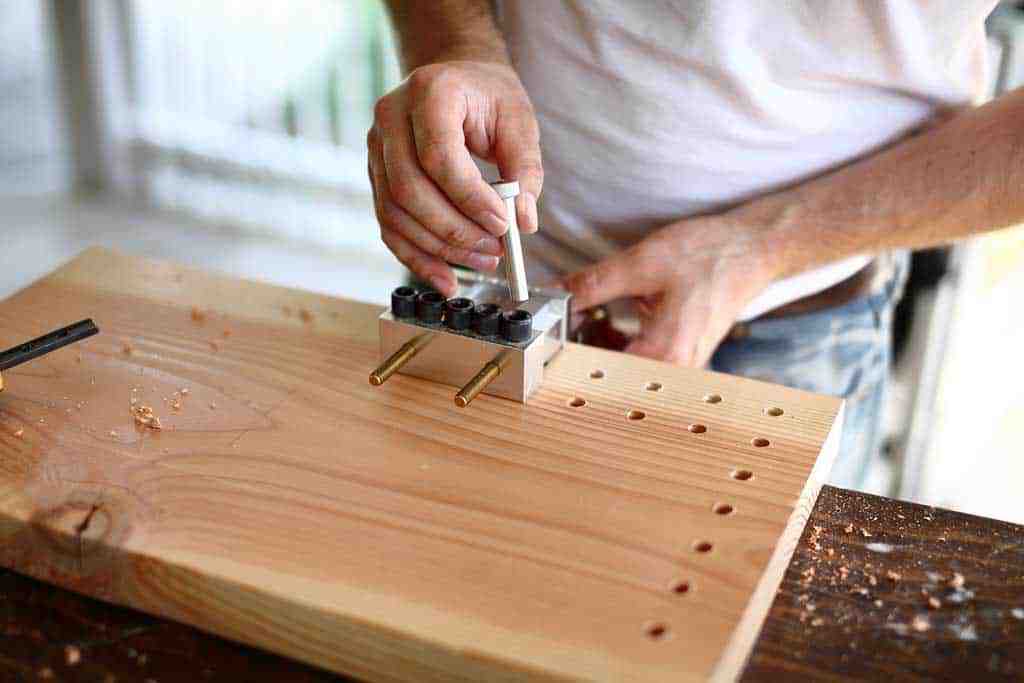 inserting the pin for dowelmax jig