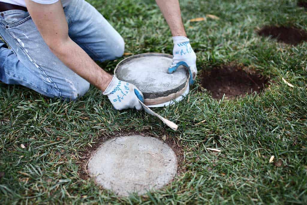 removing concrete tube from diy stepping stone
