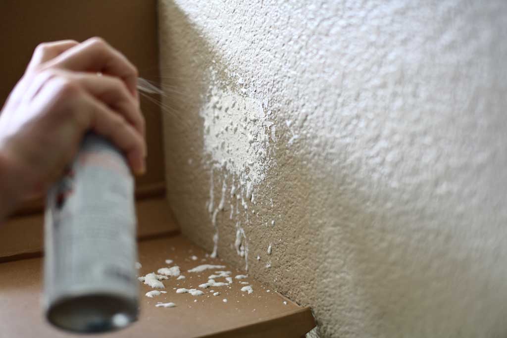 spraying drywall texture